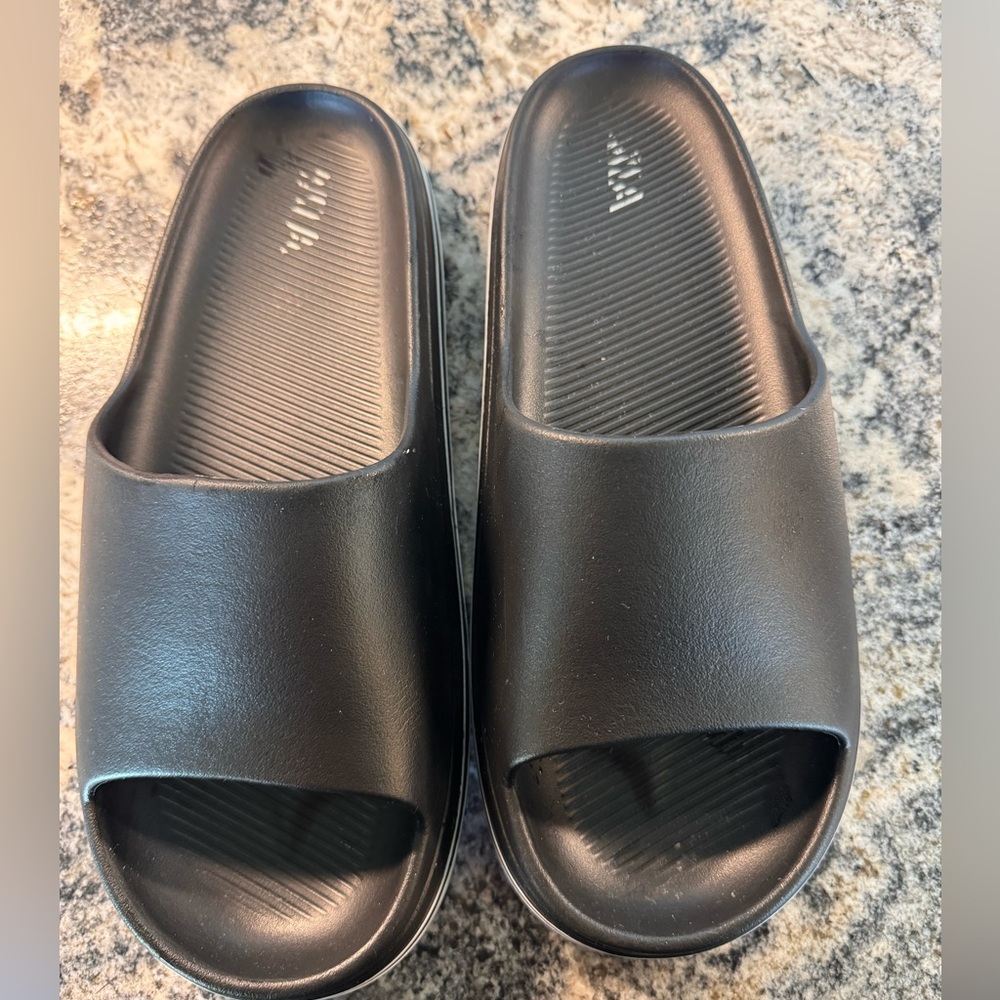MIA black slides, size 10, worn only a few times.  Material is foam/rubber